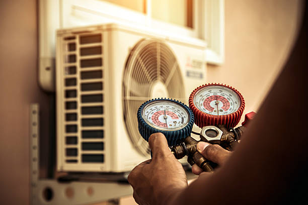 Professional Air Conditioning Service technician working in Clarksboro, NJ